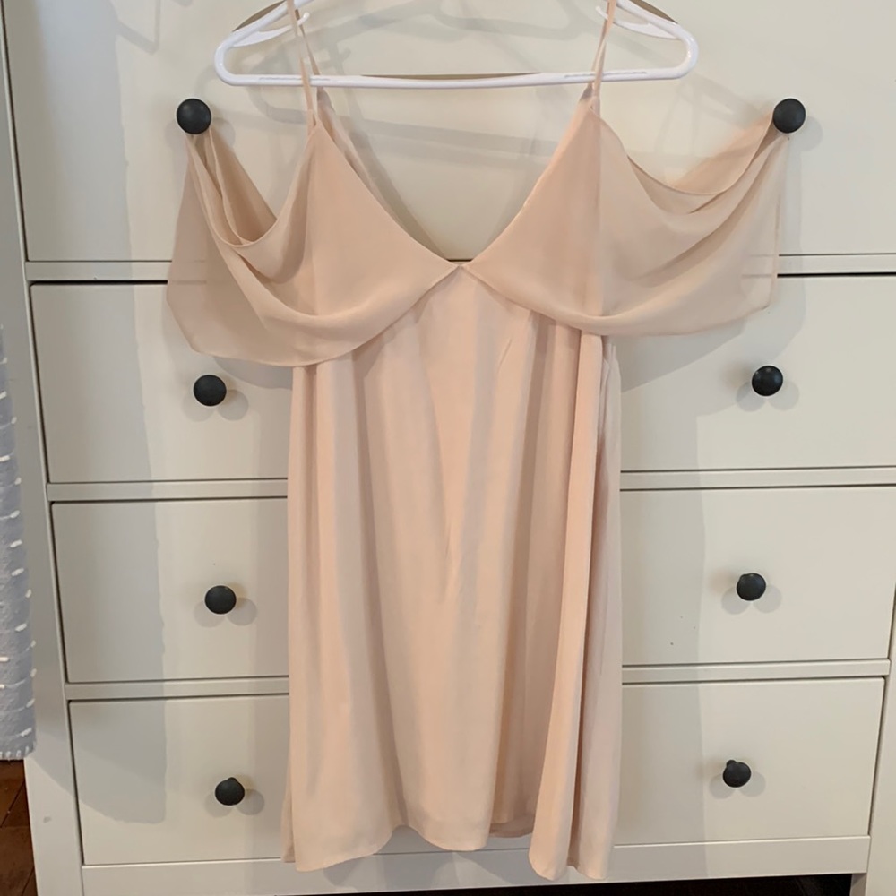 Gentle fawn spaghetti strap dress with off the shoulder sleeve detail. Baby pink